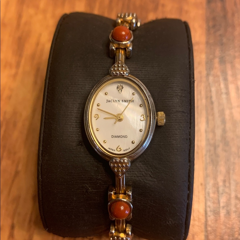 Jaclyn Smith Ladies Watch MOP face stone  accents new battery works cuff